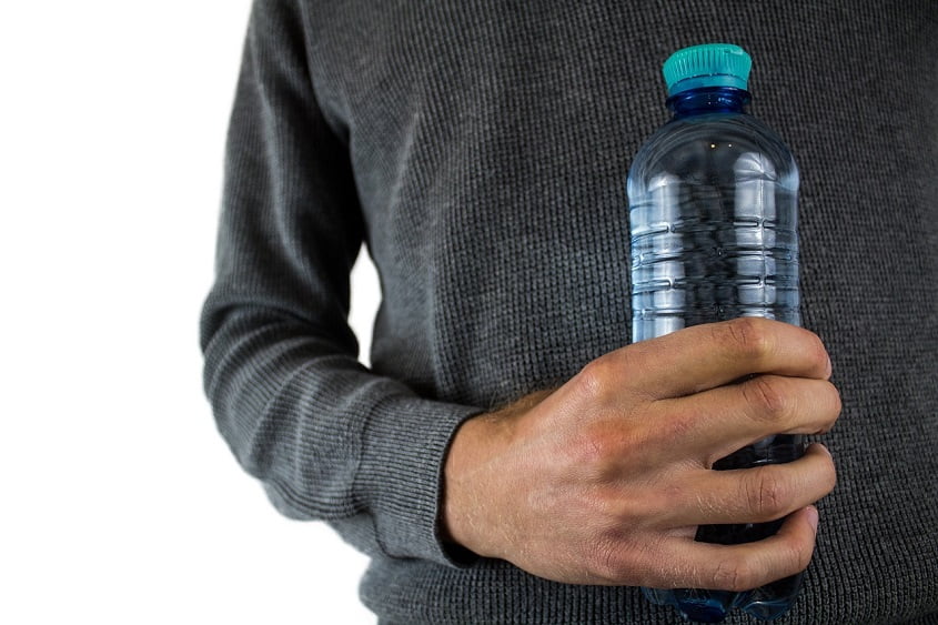 Water bottle in hand