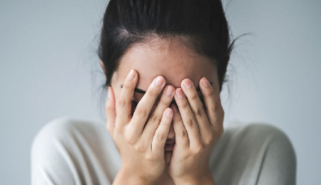female infertility sad face