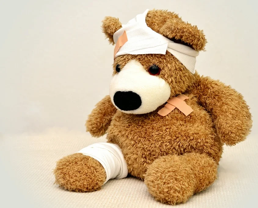 brown and white bear toy