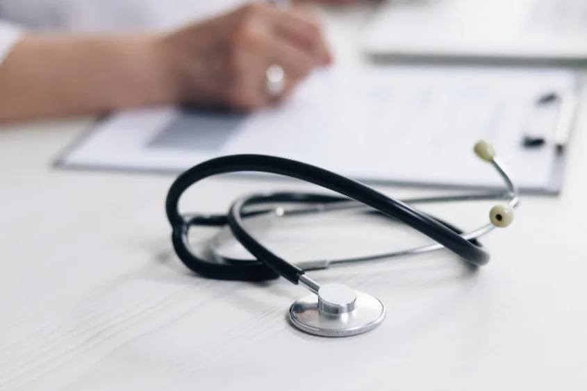 Stethoscope on Table - Illustrating Health Care Integration