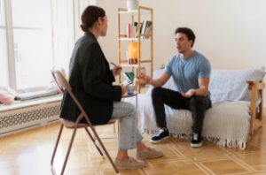 Person attending an intensive outpatient therapy session while balancing daily responsibilities