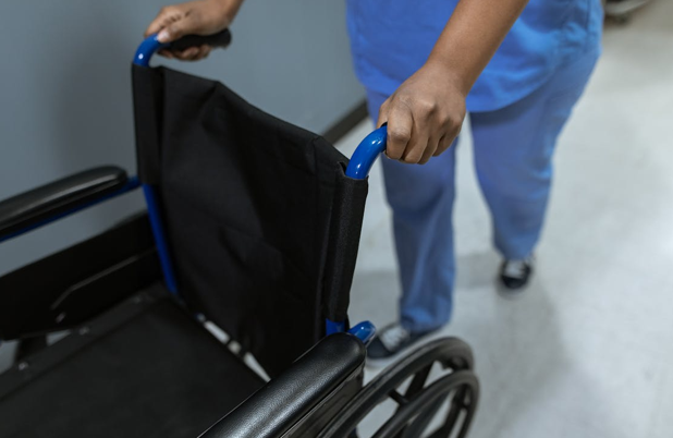 Healthcare support worker assisting a patient with daily care