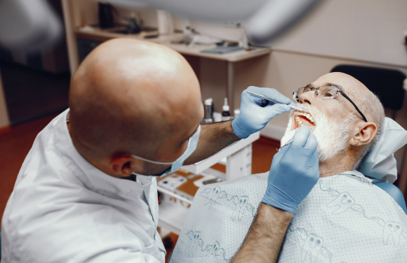 Dental examination showing multiple damaged teeth and planning for full mouth rehabilitation treatment.