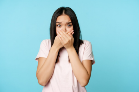 How Early Orthodontic Treatment with Metal Braces Supports Better Alignment Child with metal braces smiling during orthodontic treatment to correct teeth alignment and improve oral health.