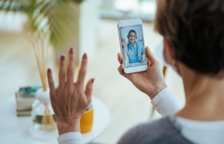 How Online Chat Is Transforming Patient Support Patient using online chat on laptop to communicate with healthcare provider for quick medical support and guidance.