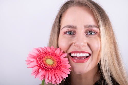 Illustration showing effects of missing tooth including shifting teeth, bone loss, and bite misalignment in the jaw.