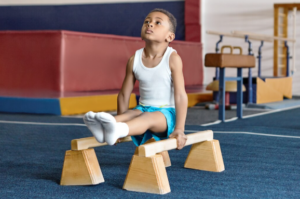 Child developing balance and coordination through gross motor activities