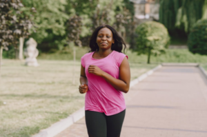 adult aoman walking outdoors as part of an active lifestyle routine