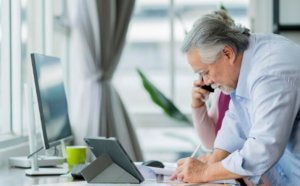 Personal injury attorney reviewing medical bills and insurance subrogation documents for an accident victim