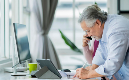 Personal injury attorney reviewing medical bills and insurance subrogation documents for an accident victim