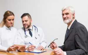 Medical malpractice attorney reviewing hospital records and legal documents related to a patient injury claim
