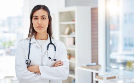 Common Symptoms That Need an OBGYN’s Attention OBGYN doctor about reproductive health symptoms during medical appointment