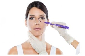 Plastic surgeon consulting with a professional about blepharoplasty to improve eyelid appearance and vision.
