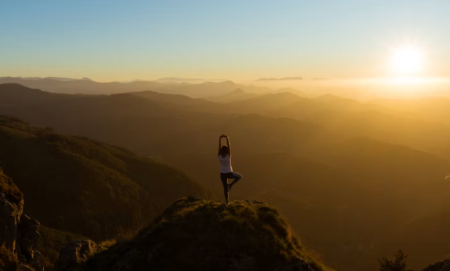 Person practicing healthy lifestyle habits including exercise, hydration, and mindfulness