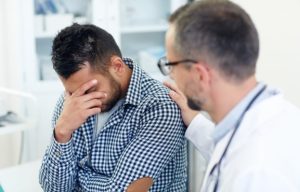 Everyday Ways To Address Erectile Dysfunction Early Healthcare provider discussing erectile dysfunction treatment options with an adult male patient during a private consultation.