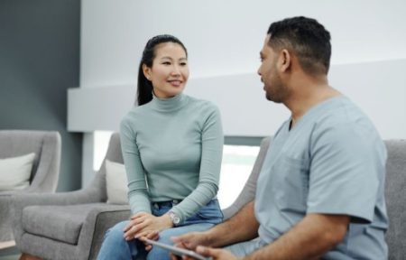 How to Start TRT Conversations With Less Stress Healthcare provider discussing testosterone replacement therapy with an adult male patient.