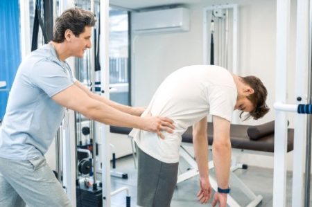 Extending Cervical Rehabilitation Beyond the Clinic: The Role of Home Cervical Traction in Patient Recovery Patient using a home cervical traction device as part of a physical therapy rehabilitation program.