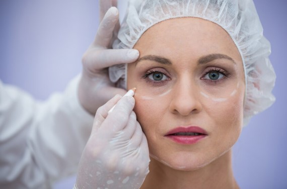 a patient about modern blepharoplasty (eyelid surgery) options.