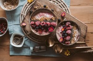Everyday Habits That Help Support Better Gut Balance Healthy meal with fiber-rich foods, yogurt, fruits, vegetables, and water