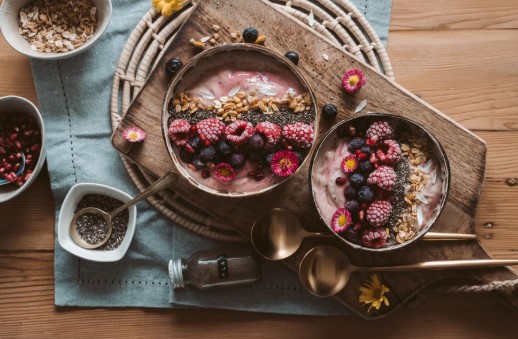 Healthy meal with fiber-rich foods, yogurt, fruits, vegetables, and water