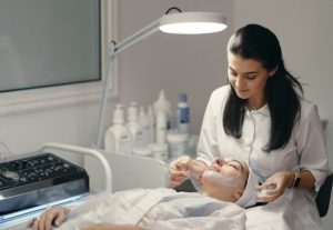 5 Medspa Treatments That Pair Well With a Medical-Grade Skincare Routine Aesthetic professional performing a medical-grade skincare treatment in a medspa setting.