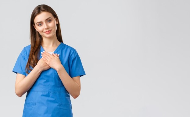 Nursing student studying online while preparing for clinical training at home.