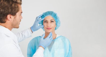 5 Essential Things to Look For Before You Do Plastic Surgery Board-certified plastic surgeon consulting with a patient before cosmetic surgery while reviewing treatment options and expected outcomes.