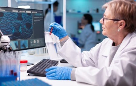 The Medical Science Behind Raw DNA Analysis: Understanding Genetic Variants and Their Clinical Significance Scientist analyzing raw DNA sequencing data on a computer for genetic variant interpretation.