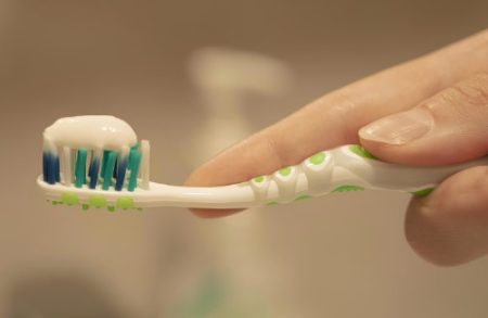 caring patient's teeth and gums