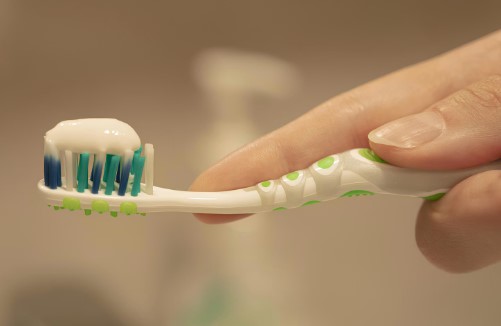 caring patient's teeth and gums