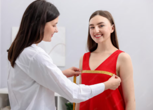 Examining Life After Breast Reduction: 6 Realistic Expectations to Have Woman recovering after breast reduction surgery.