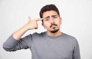 adult experiencing dry, irritated eyes