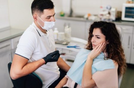 Understanding Dental Anxiety: Why Most Adults Fear the Dentist Patient speaking with a dentist about dental anxiety and ways to feel more comfortable during treatment.