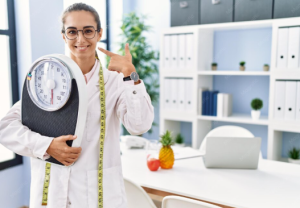 Healthcare professional explaining a medically supervised weight loss plan