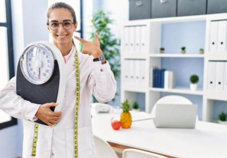Healthcare professional explaining a medically supervised weight loss plan