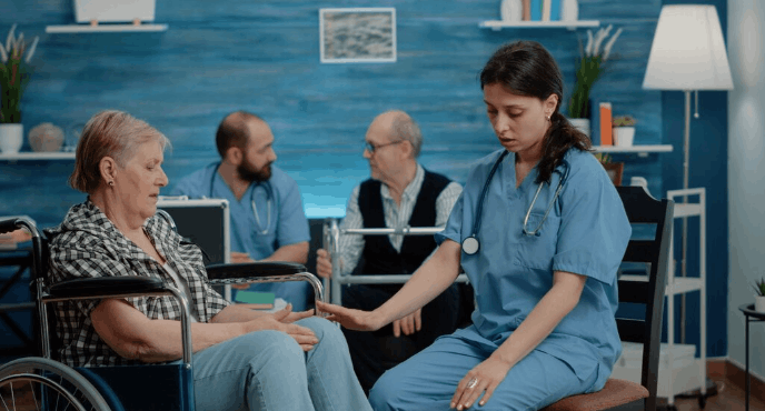 Person with locked-in syndrome receiving specialized medical care and communication support.