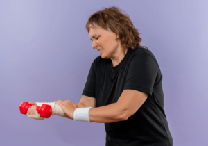 Can Hand Exercises Help Arthritis? What Research Shows Person performing gentle hand exercises to improve movement and strength with arthritis.