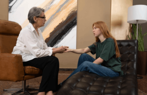 How Modern Therapy Is Changing the Way We Approach Mental Health Therapist conducting a modern mental health therapy session with a patient.