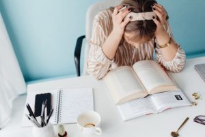 Best Apps for ADHD College Students: Tools to Manage Symptoms and Stay on Track College student using a planner app on a laptop to manage assignments and study schedules