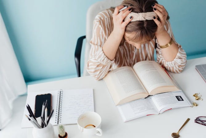 Best Apps for ADHD College Students: Tools to Manage Symptoms and Stay on Track College student using a planner app on a laptop to manage assignments and study schedules