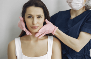 Five Questions To Ask Before Scheduling A Deep Plane Facelift Woman discussing deep plane facelift options with a plastic surgeon