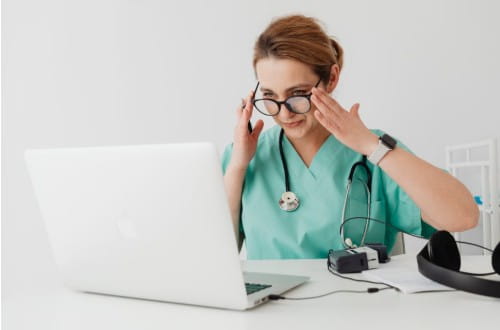 Registered nurse studying online to earn a Bachelor of Science in Nursing degree