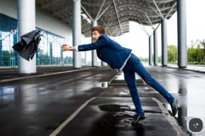 Not Sure Who Owns the Floor You Fell On? A Slip and Fall Lawyer in Las Vegas Can Find Out Wet floor in a commercial walkway highlighting potential slip and fall hazards