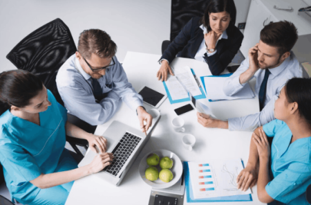 How Integrative Care Teams Build Treatment Plans Patients Actually Understand Healthcare professional organizing a patient treatment plan by priority and level of importance