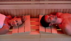 Infrared Sauna and Health, What the Research Says About Heat Exposure Person using an infrared sauna